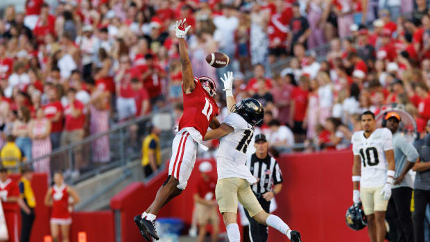 Wisconsin cornerback Alexander Smith in coverage against Purdue wide receiver Charlie Jones.